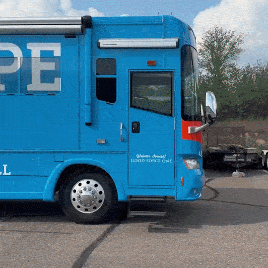 A GIF of the two sides of the Faith, Hope, & Love bus.